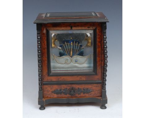 A French Palais Royal amboyna and ebonised musical scent and etui cabinet, hinged cover and fall front enclosing a pair of gi
