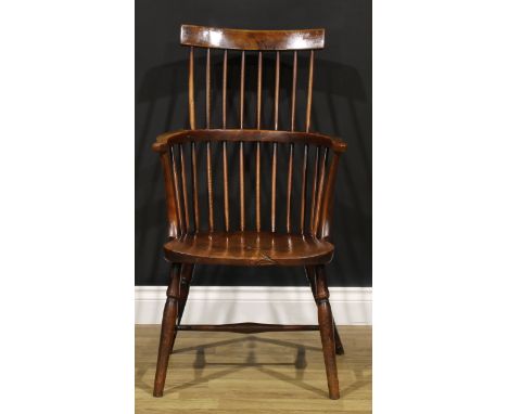 A 19th century elm and fruitwood Windsor elbow chair, stick-back with curved cresting rail, 94cm high, 52cm wide, the seat 39