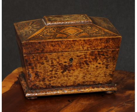 A Victorian pokerwork sarcophagus tea caddy, decorated overall with pyrography, hinged cover enclosing a pair of lidded compa