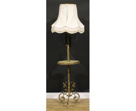Interior Design - a gilt brass and onyx telescopic floor lamp, incorporating a circular wine plateau, spiral column, the trif