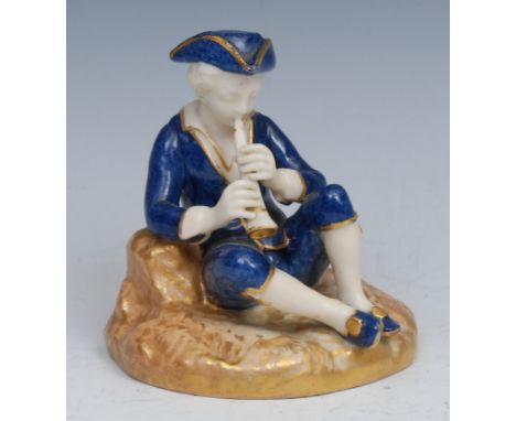 A Royal Worcester figure, of a boy seated playing a pipe, decorated in powder blue, 10cm high, printed crown and circle mark,