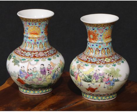 A pair of Chinese ovoid vases, painted in polychrome with Hundred Boys, bats and auspicious symbols, 16.5cm high, blue seal m