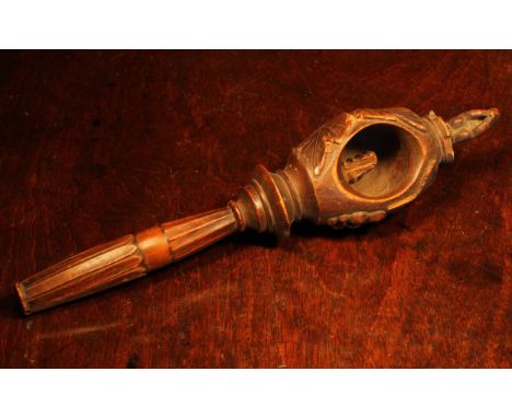 Nutcrackers - a Black Forest novelty screw-action nut cracker, carved with fruiting vine crested by a squirrel, lotus grip, 2