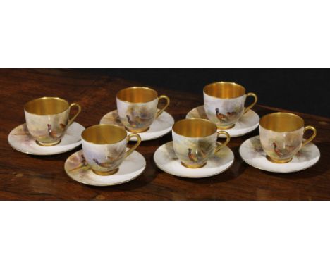 A set of six Royal Worcester coffee cups and saucers, painted by James Stinton, signed, with pheasants, burnished gilt border