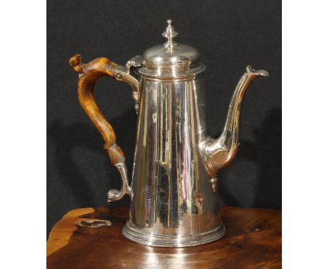 An early George II silver conical coffee pot, hinged domed cover, knop finial, scroll capped fruitwood handle, skirted base, 