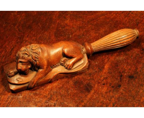 Nutcrackers - a Black Forest novelty screw-action nut cracker, carved after Bertel Thorvaldsen (1770 - 1844) as the Lion of L