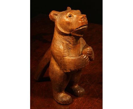 Nutcrackers - a Black Forest novelty lever-action nut cracker, carved as a bear, standing, hungry for nuts, 18.5cm high, c.18