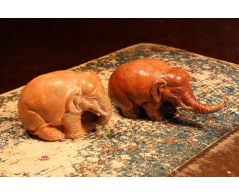 Alfred Lyndhurst Pocock (1882 - 1962), a terracotta cabinet sculpture, of an elephant, standing, with trunk curled, 5.5cm lon