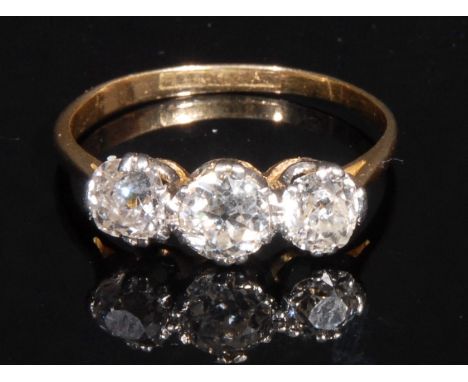 A diamond ring, set with three old European cut diamonds,  ranging between approx 4.6mm and 5.1mm diameters, total estimated 