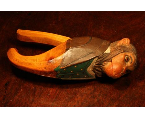 Nutcrackers - a Black Forest novelty lever-action nut cracker, carved and painted as a monkey, finely dressed in waistcoat an