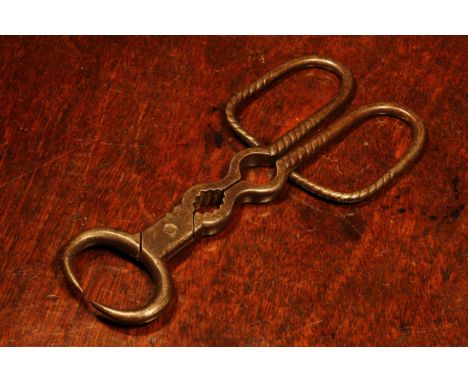 Nutcrackers - a pair of 18th century steel pincer-form lever-action nut cracker, ropetwist scissor type grips, 16cm long, Fre