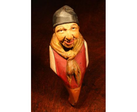 Nutcrackers - a Black Forest novelty lever-action nut cracker, carved and painted as a gypsy wearing a tasselled cap, 19cm lo
