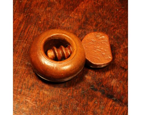 Nutcrackers - an early 19th century boxwood ring shaped screw-action pocket nut cracker, 7cm over thumbpiece, c.1820Reference