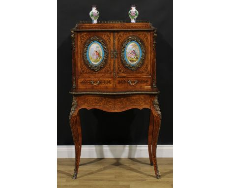 A 19th century French gilt metal and porcelain mounted kingwood and rosewood bonheur du jour form boudoir cabinet, pierced ga