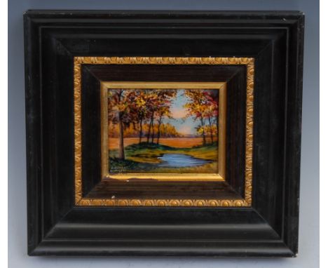 A Limoges enamel rectangular plaque, painted with a woodland pool, 7cm x 8.5cm 