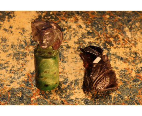 Alfred Lyndhurst Pocock (1882 - 1962), an aquamarine carving, fragmentary classical head, cylindrical pillar, signed, 5.5cm h