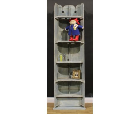 Interior Decoration - an unusual bookcase, formed from a repurposed canoe, Leader, 221cm high, 62cm wide, 35cm deep 