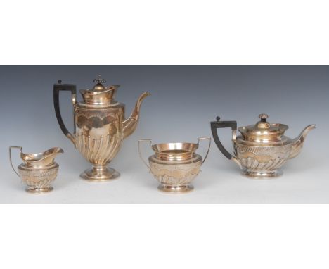 A Victorian silver composed four piece batwing fluted tea and coffee service, comprising teapot, coffee pot, sugar basin and 