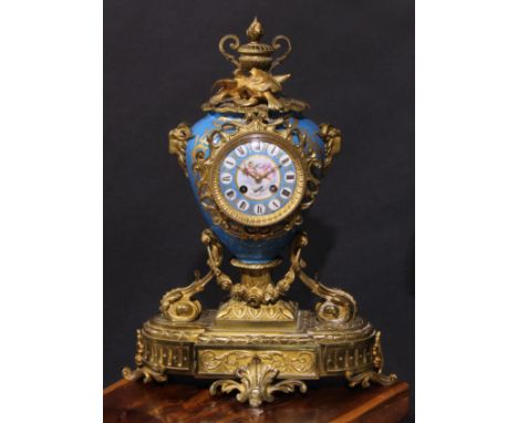 A 19th century French gilt metal and porcelain mantel clock, 10cm dial with Roman numerals, painted in the manner of Sèvres o