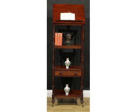 A 19th century mahogany four-tier library whatnot, rectangular plateaux, the upper adjustable on a ratchet with reading ledge