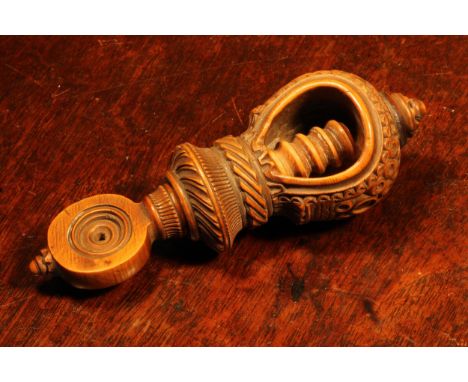 Nutcrackers - a 19th century boxwood screw-action nut cracker, drilled and chip-carved decoration, 12.5cm long, c.1820-  1840