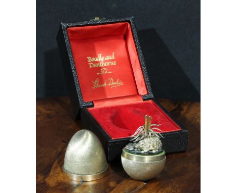 Stuart Devlin (1931 - 2018) - an Elizabeth II silver-gilt surprise egg, enclosing a hedgehog, no.212, 7cm high, London 1978, 