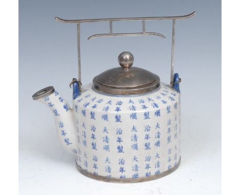 A Chinese silver mounted tea or wine pot and cover, decorated overall with characters and verse,  paifang shaped handle, ball