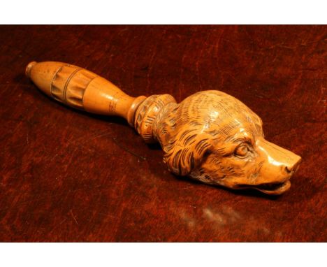 Nutcrackers - a Black Forest novelty screw-action nut cracker, carved as the head of a dog, lotus grip, 21.5cm long, c.1870 