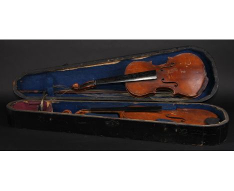 A violin, the two-piece back 33.5cm long excluding button, Stradivarius label, outlined with purfling, 56cm long overall, the