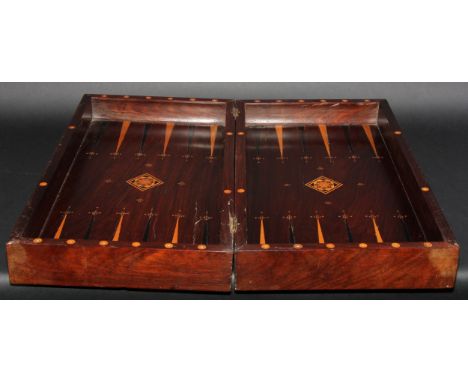 A 19th century rosewood and satinwood parquetry rectangular games box, opening to a board inlaid for chess, the interior laid