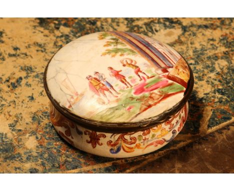 A George III South Staffordshire enamel circular table snuff box, hinged cover painted with figures at an Italianate harbour,