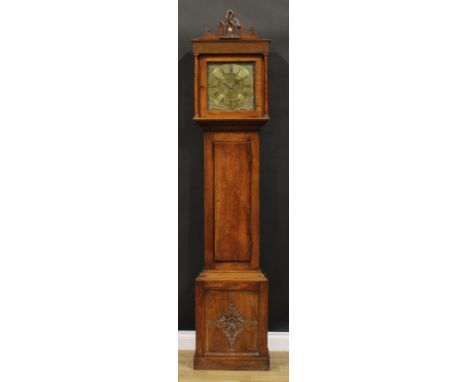 An 18th century oak longcase clock, 28cm square brass dial inscribed with Roman and subsidiary Arabic numerals, 30 hour movem