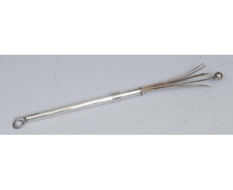 An Art Deco style silver champagne swizzle stick, telescopic action, 8.5cm long, marked 925 