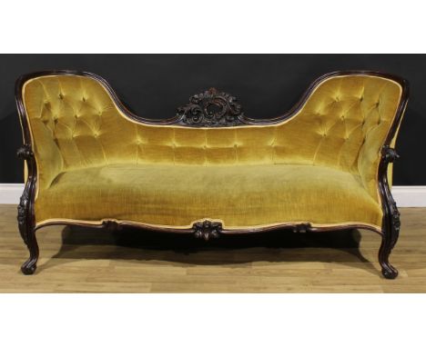 A Victorian rosewood double-Récamier sofa, shaped cresting carved with scrolling acanthus, stuffed-over upholstery, cabriole 