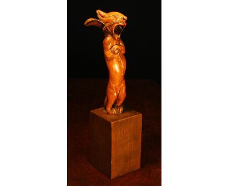 Alfred Lyndhurst Pocock (1882 - 1962), a laburnum carving, The Sleepy Dormouse, From Alice in Wonderland, 16.5cm high, signed