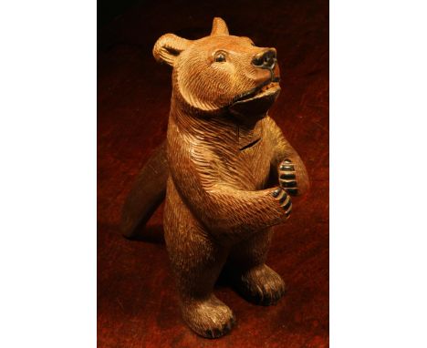 Nutcrackers - a Black Forest novelty lever-action nut cracker, as a bear, standing, full length, painted features, 18.5cm hig