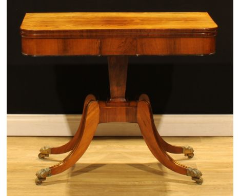 A Regency rosewood card table, hinged top enclosing a baize lined playing surface, tapered-to-spreading square column, incurv