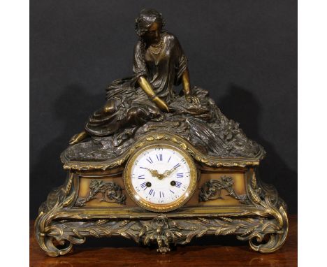 A late 19th century French dark patinated and gilt metal figural mantel clock, 10cm convex enamel dial inscribed E. E. Emanue