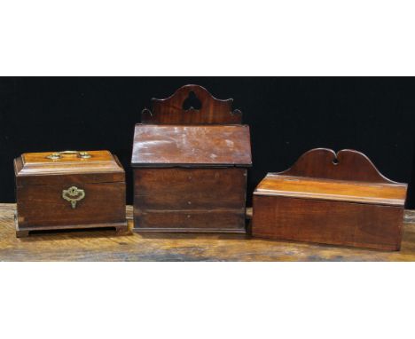 A George II mahogany tea caddy, sarcophagus cover enclosing three compartments, bracket feet, 24cm wide, c.1750; a 19th centu