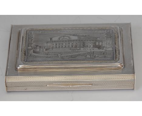 A Russian silver and niello rectangular snuff box, the hinged cover decorated with a view of a Neo-Classical building, gilt i