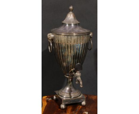 A 19th century silver on copper Neoclassical tea urn of vase form, lofty cover, the whole fluted and embossed with stiff leav