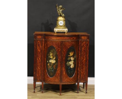 A Sheraton period satinwood and painted bow-centre side cabinet, slightly oversailing crossbanded top above a pair of doors, 