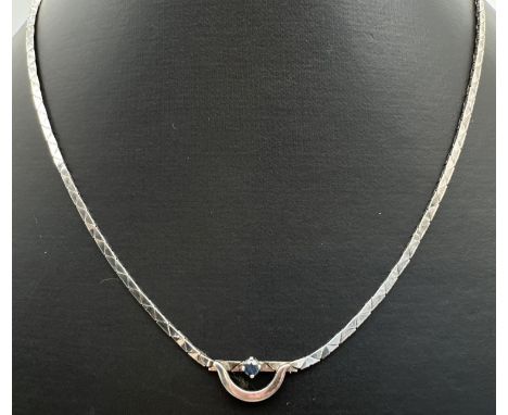 A 925 silver 15" fixed pendant necklace with flat triangular shaped links. Pendant set with central sapphire, stamped 925 and