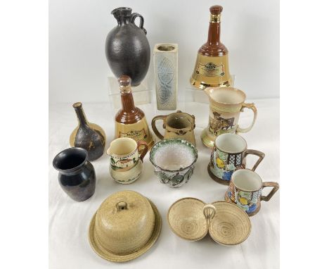 A box of assorted vintage ceramics to include studio pottery, large Wade Bells whisky decanters, Torquay ware jug and Radford