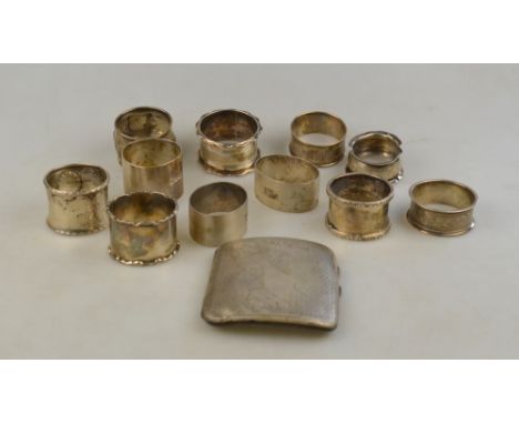 Eleven silver napkin rings to/w an engine turned cigarette case- various makers and dates, 11.4 oz total
