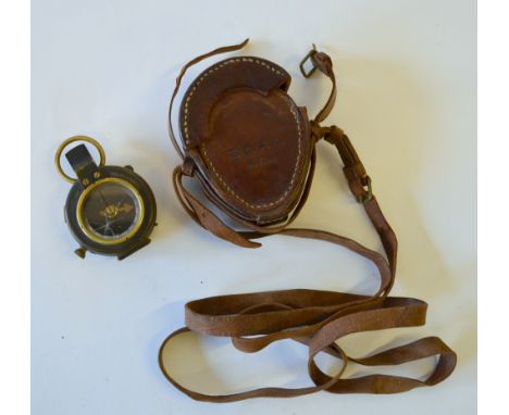 A WWI Verner's Pattern VIII military bearing-compass no. 89774, 1917, with mother-of-pearl dial, the leather case stamped 'EC