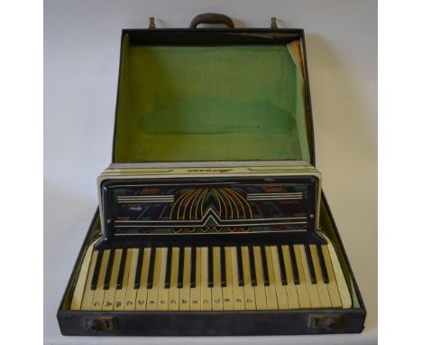 A cased Lorenzo piano-accordion with cream marbled body