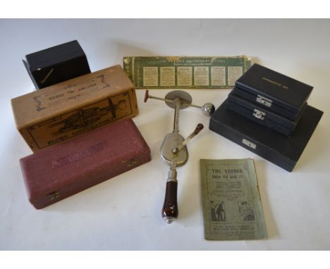 A collection of vintage medical instruments, including cased otoscope, cased May Opthalmoscope, boxed Macaura's Blood Circula