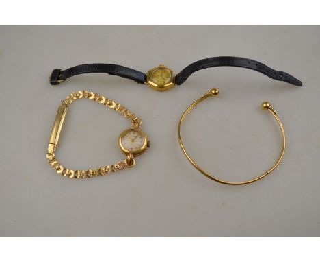 A lady's 9ct gold Rolex Precision wristwatch with silvered dial and gilt batons and hands, 17 ruby movement, on fancy-link gi