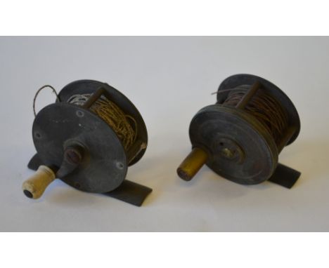 A vintage brass two inch fishing reel stamped A&NCFL, 105 Victoria St, B. to/w another, unnamed 2 " reel (2)